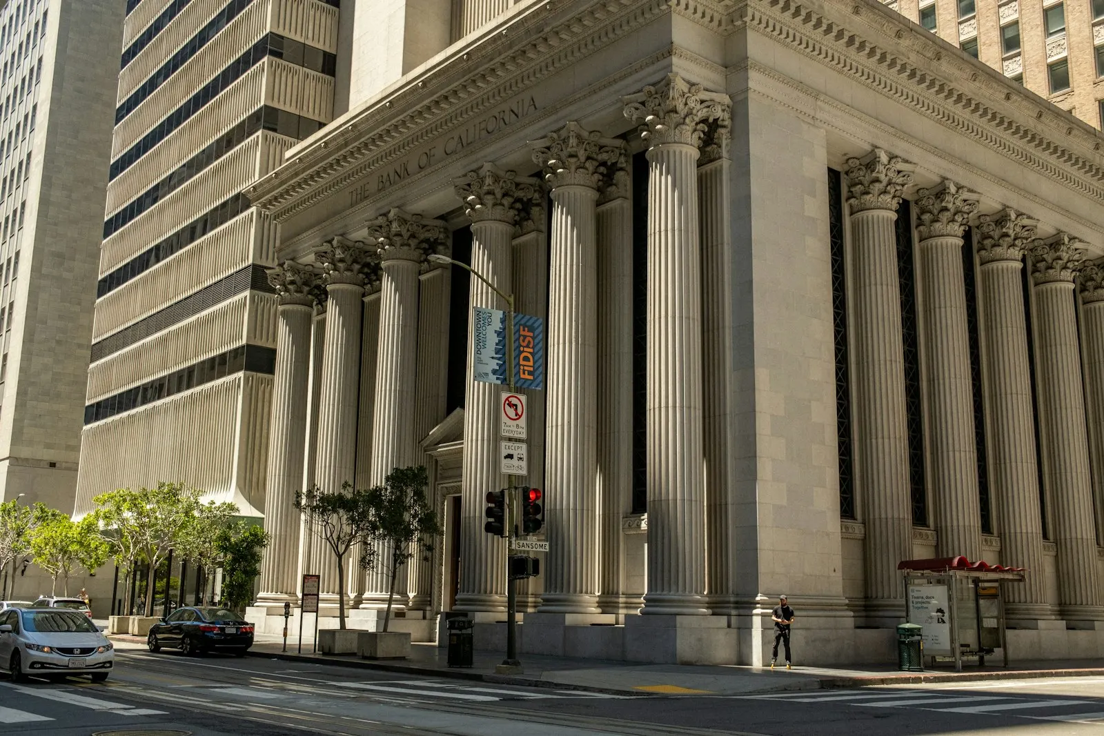 A building with columns and a street