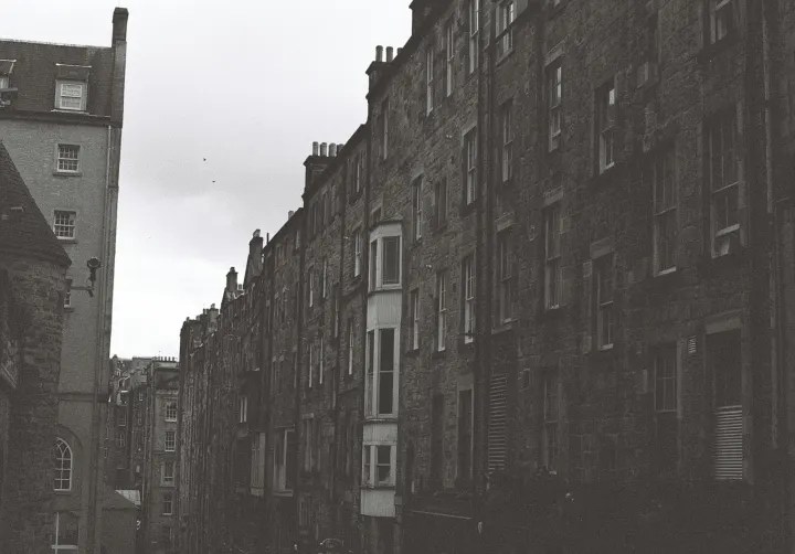 Row of old brick buildings with bay windows